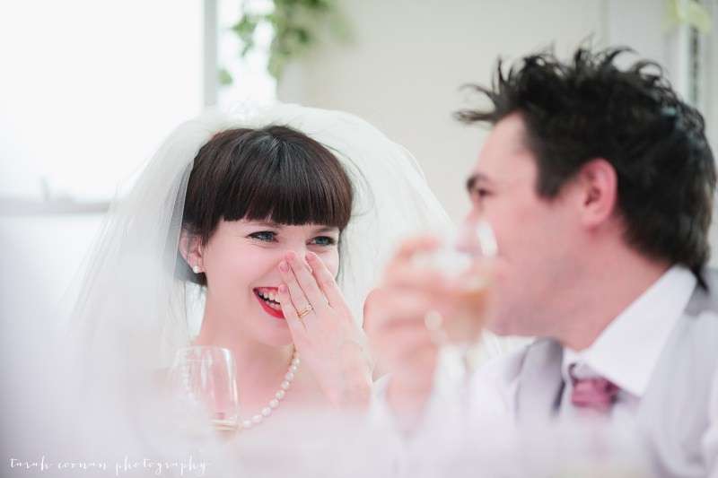bride laughing at speech